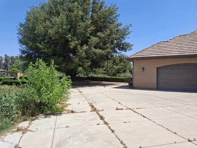 view of side of property with stucco siding
