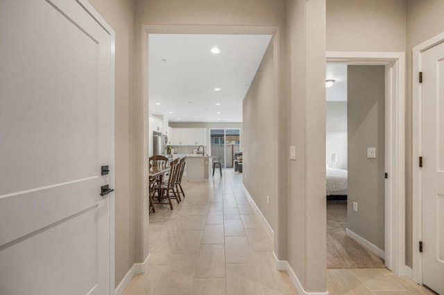4103 Ash Rd, Madera, CA 93636 - hallway featuring baseboards, light tile patterned flooring, and recessed lighting