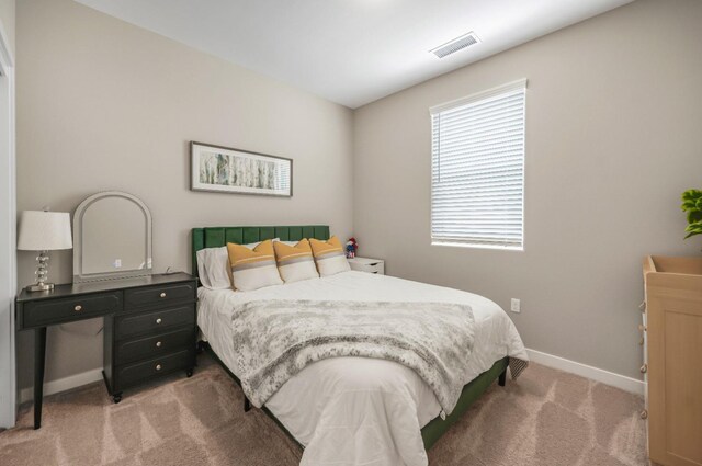 4103 Ash Rd, Madera, CA 93636 - bedroom with baseboards, visible vents, and light colored carpet