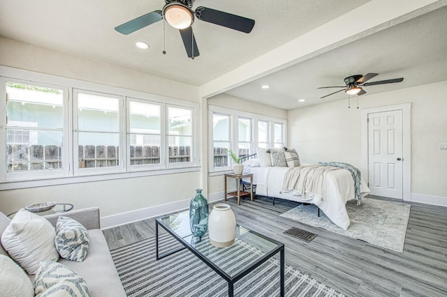 2225 N Van Ness Blvd, Fresno, CA 93704 - bedroom with baseboards, wood finished floors, recessed lighting, and ceiling fan
