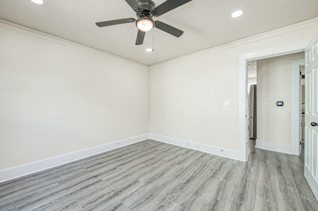 2225 N Van Ness Blvd, Fresno, CA 93704 - empty room featuring wood finished floors, crown molding, recessed lighting, ceiling fan, and baseboards