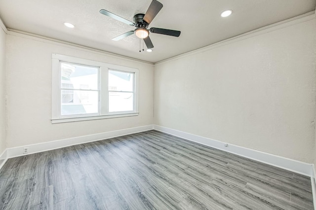 2225 N Van Ness Blvd, Fresno, CA 93704 - unfurnished room featuring crown molding, wood finished floors, baseboards, ceiling fan, and recessed lighting