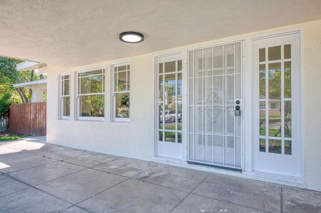 2225 N Van Ness Blvd, Fresno, CA 93704 - entrance to property featuring a patio area and stucco siding