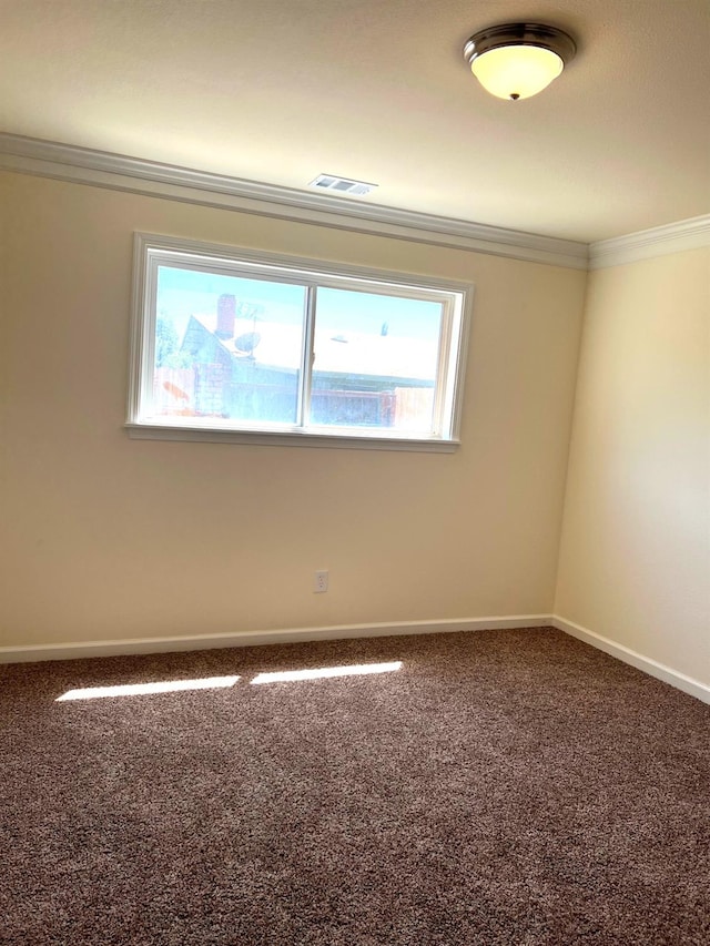 1565 Bluejay, Hanford, CA 93230 - empty room with crown molding, carpet flooring, and baseboards