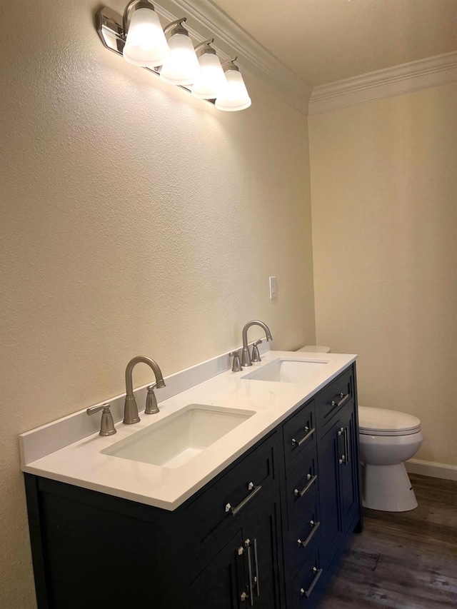 1565 Bluejay, Hanford, CA 93230 - bathroom with toilet, ornamental molding, wood finished floors, and double vanity