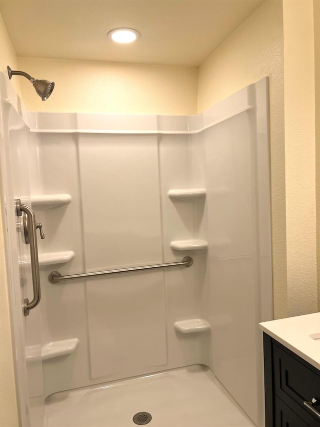 1565 Bluejay, Hanford, CA 93230 - bathroom featuring a stall shower and vanity