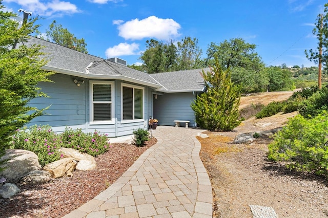 43443 Running Deer Dr, Coarsegold, CA 93614 - view of exterior entry featuring a shingled roof