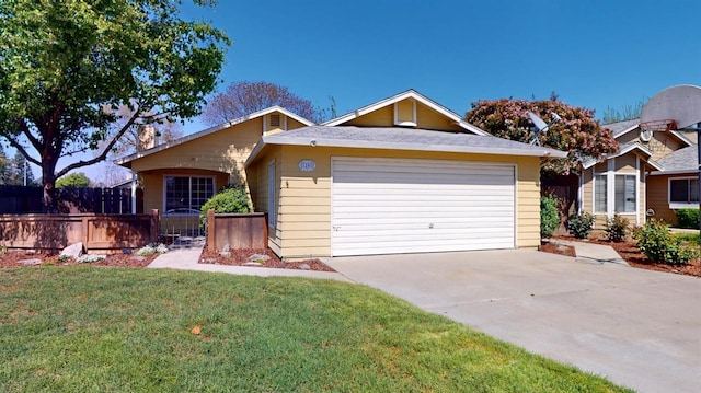 1201 Rayser St, Kingsburg, CA 93631 - single story home featuring fence, driveway, a front yard, and a garage