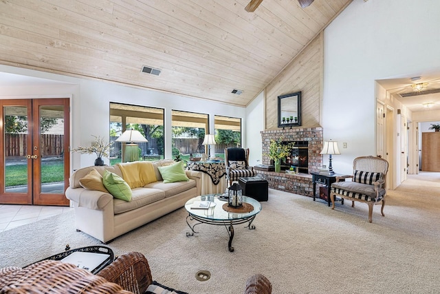living room with a brick fireplace, high vaulted ceiling, wooden ceiling, french doors, and a ceiling fan