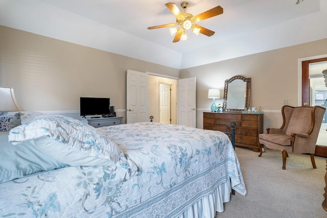 bedroom with ceiling fan and light colored carpet