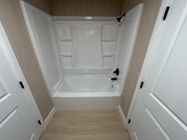 31083 Bear Paw Way, Coarsegold, CA 93614 - bathroom with wood finished floors, baseboards, and bathing tub / shower combination