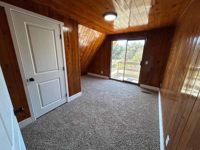 31083 Bear Paw Way, Coarsegold, CA 93614 - bonus room with wood ceiling, carpet flooring, wood walls, visible vents, and vaulted ceiling