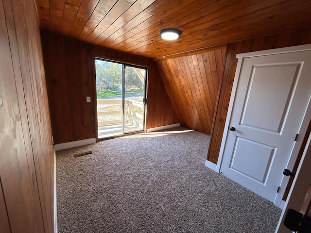 31083 Bear Paw Way, Coarsegold, CA 93614 - bonus room featuring wood walls, wooden ceiling, visible vents, and carpet floors