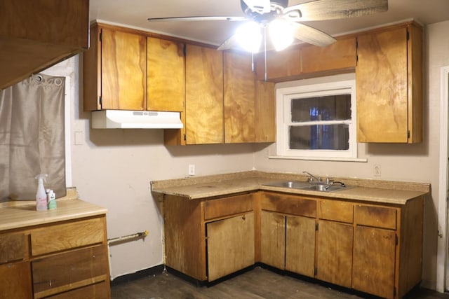 1850 Sheridan St Unit 3/4, Selma, CA 93662 - kitchen with under cabinet range hood, a ceiling fan, a sink, brown cabinetry, and light countertops