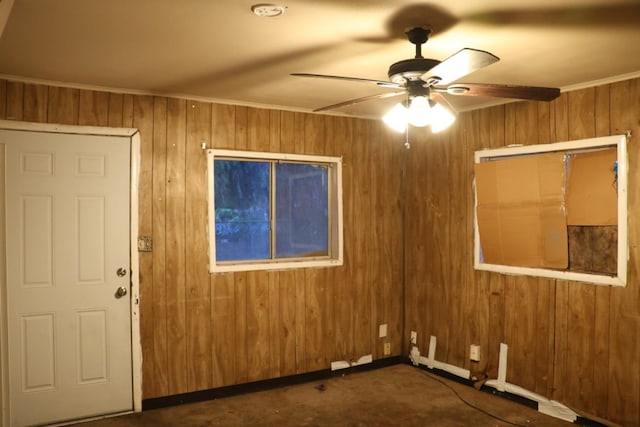 1850 Sheridan St Unit 3/4, Selma, CA 93662 - carpeted empty room featuring ceiling fan, wood walls, and crown molding