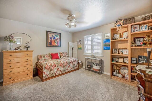 bedroom featuring a ceiling fan and carpet flooring