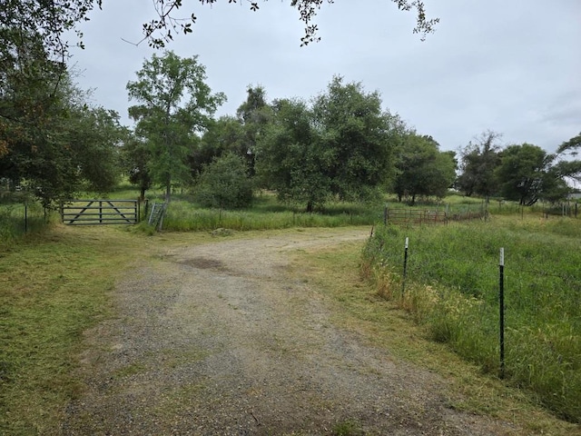 28826 Auberry Rd, Clovis, CA 93619 - view of road with a rural view and a gate