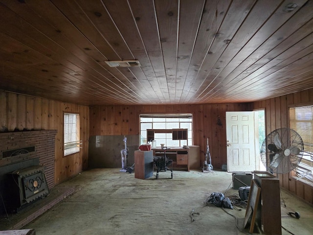 28826 Auberry Rd, Clovis, CA 93619 - interior space featuring visible vents, a wealth of natural light, a wood stove, and wood ceiling