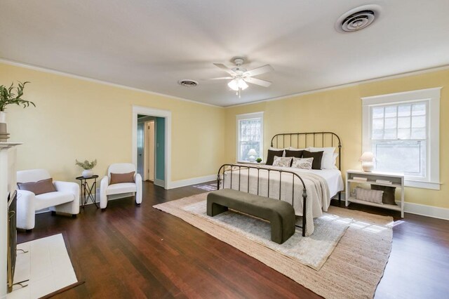605 E Home Ave, Fresno, CA 93728 - bedroom featuring visible vents, dark wood-type flooring, and multiple windows