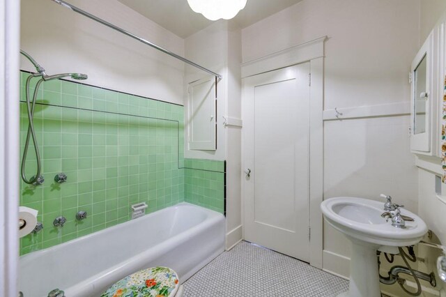 605 E Home Ave, Fresno, CA 93728 - bathroom with tile patterned floors and shower / tub combination