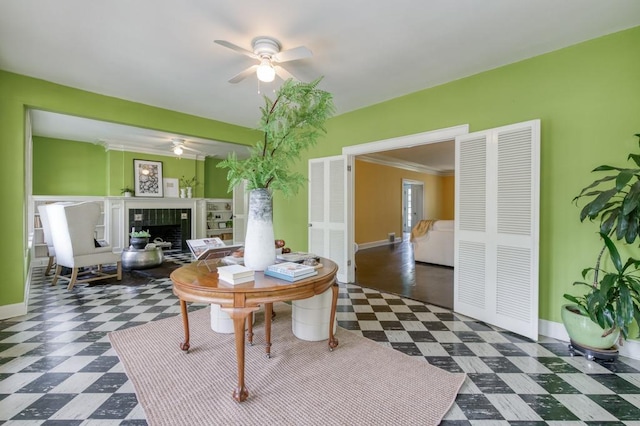 605 E Home Ave, Fresno, CA 93728 - dining area with baseboards, ceiling fan, tile patterned floors, and a tile fireplace