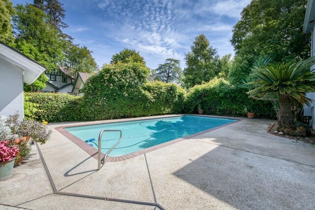 605 E Home Ave, Fresno, CA 93728 - view of swimming pool featuring a patio and a fenced in pool