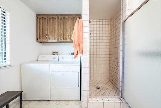 washroom featuring laundry area and washing machine and dryer
