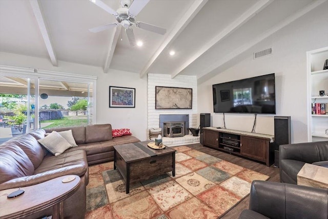 living room with light wood-style flooring, visible vents, ceiling fan, and vaulted ceiling with beams