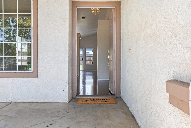 5634 W Donner Ave, Fresno, CA 93722 - property entrance featuring visible vents and stucco siding