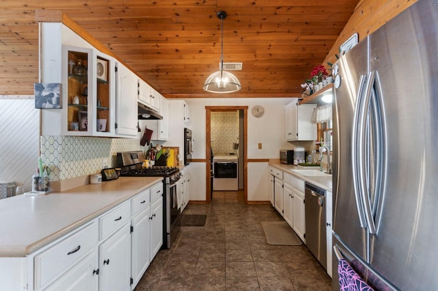 31008 N Dome Dr, Coarsegold, CA 93614 - kitchen with stainless steel appliances, a sink, washer / dryer, wooden ceiling, and under cabinet range hood