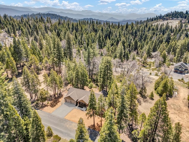 42596 Garnet Ln, Shaver Lake, CA 93664 - bird's eye view of a heavily wooded area and a mountain backdrop