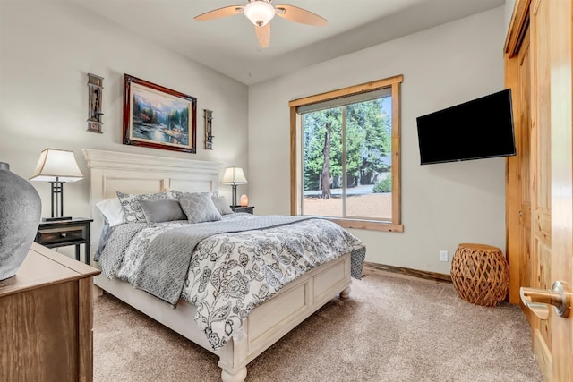 42596 Garnet Ln, Shaver Lake, CA 93664 - bedroom featuring baseboards, a ceiling fan, and light colored carpet