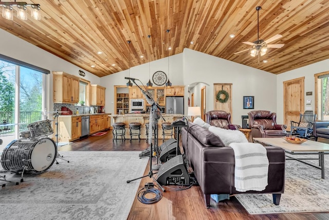42596 Garnet Ln, Shaver Lake, CA 93664 - living room featuring wooden ceiling, a wealth of natural light, dark wood-type flooring, and vaulted ceiling
