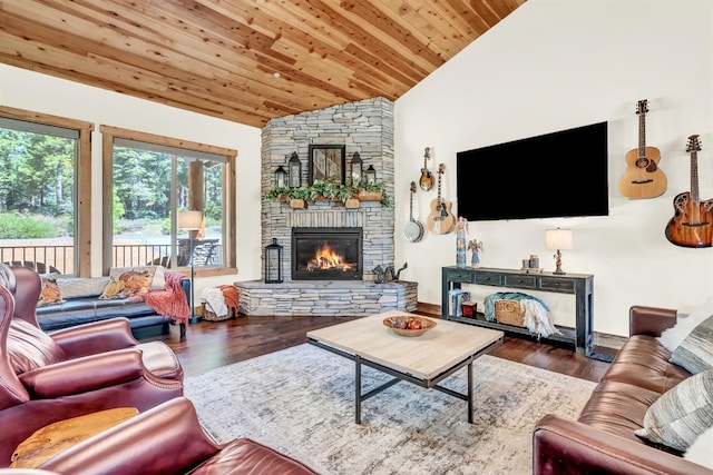 42596 Garnet Ln, Shaver Lake, CA 93664 - living room featuring vaulted ceiling, a stone fireplace, wood finished floors, and wood ceiling