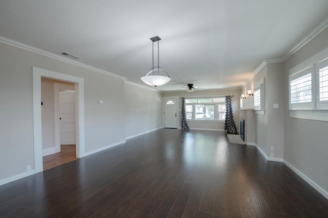 unfurnished living room with visible vents, ceiling fan, baseboards, dark wood-style flooring, and a fireplace