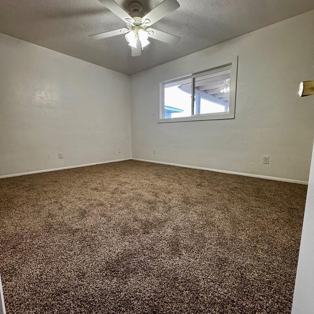 201 Walnut St, Madera, CA 93637 - spare room with a textured ceiling, ceiling fan, baseboards, and carpet