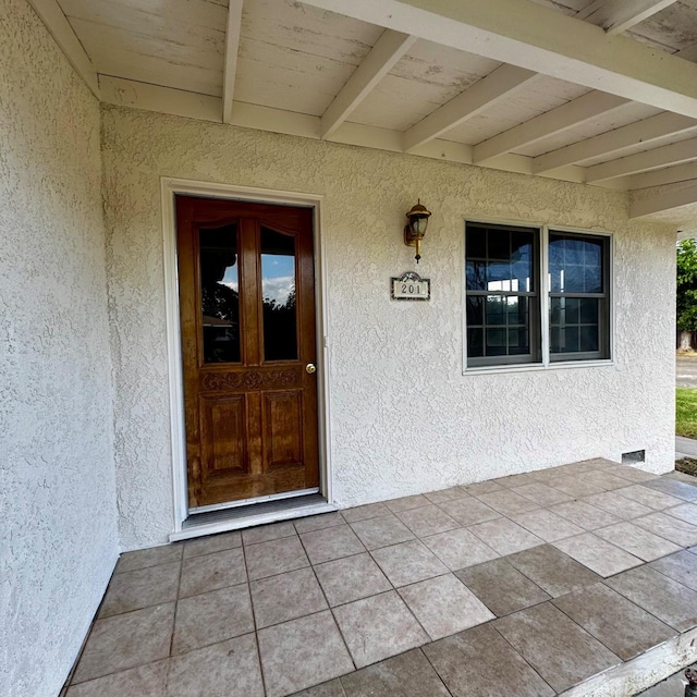 201 Walnut St, Madera, CA 93637 - view of exterior entry featuring stucco siding