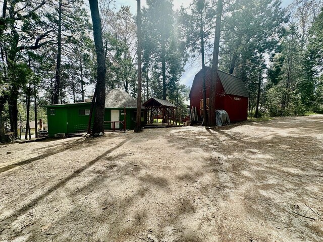 41778 Muskrat Ln, Auberry, CA 93602 - view of yard featuring a barn and an outdoor structure
