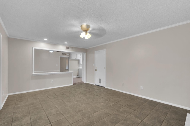 interior space featuring crown molding, a textured ceiling, a ceiling fan, and baseboards