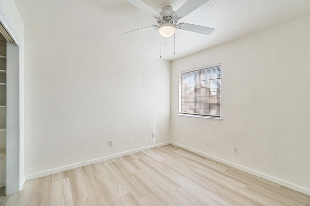 467 E Alluvial Ave Unit 106, Fresno, CA 93720 - empty room featuring light wood finished floors, baseboards, and ceiling fan