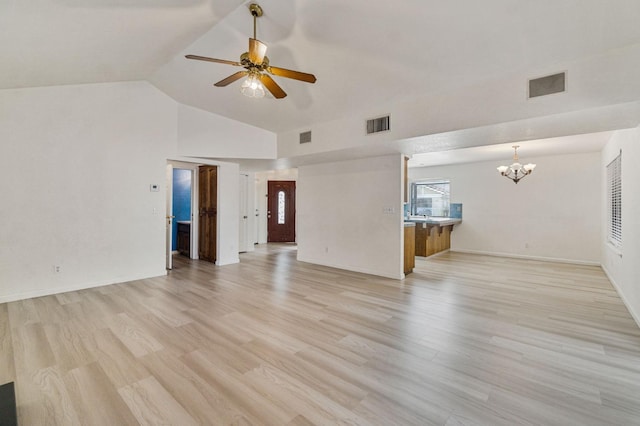 467 E Alluvial Ave Unit 106, Fresno, CA 93720 - unfurnished living room featuring a chandelier, ceiling fan, light wood-type flooring, and high vaulted ceiling