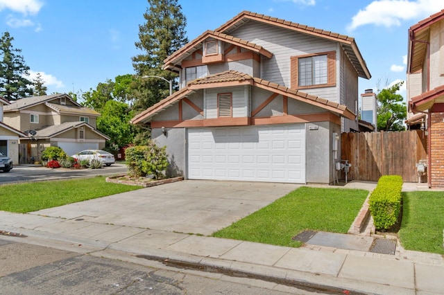 467 E Alluvial Ave Unit 106, Fresno, CA 93720 - view of front of property with a tile roof, fence, a garage, and stucco siding