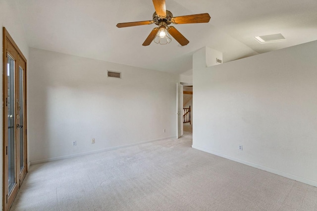 467 E Alluvial Ave Unit 106, Fresno, CA 93720 - unfurnished room with light colored carpet, lofted ceiling, baseboards, and a ceiling fan