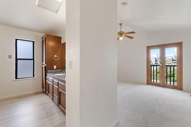467 E Alluvial Ave Unit 106, Fresno, CA 93720 - bathroom featuring a ceiling fan, vaulted ceiling, baseboards, vanity, and french doors