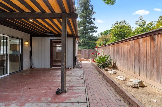 467 E Alluvial Ave Unit 106, Fresno, CA 93720 - view of patio with a fenced backyard and a wooden deck