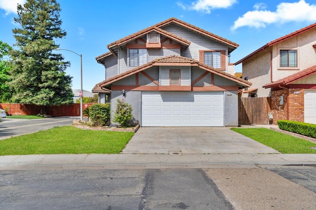 467 E Alluvial Ave Unit 106, Fresno, CA 93720 - view of front facade featuring a tiled roof, fence, and concrete driveway