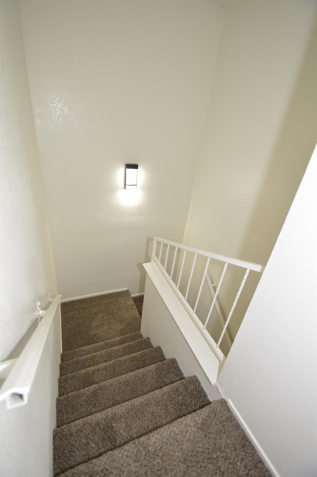 4765 N Cedar Ave Unit 105, Fresno, CA 93726 - stairway with carpet flooring and baseboards