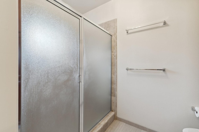 full bath featuring a stall shower