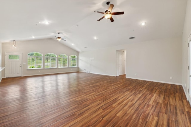 unfurnished living room featuring wood finished floors, vaulted ceiling, ceiling fan, baseboards, and visible vents