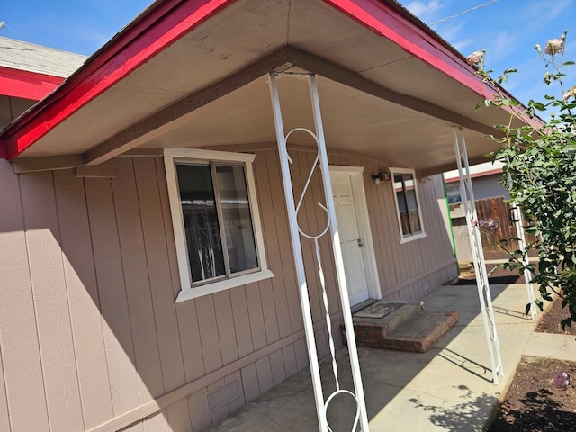 property entrance with fence